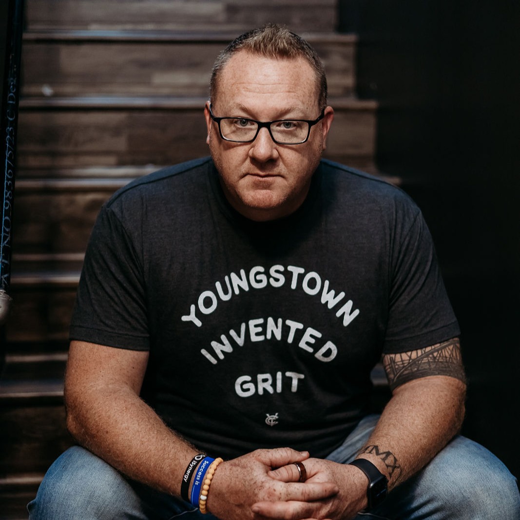 Steve Cross wearing a “Youngstown Invented Grit” t-shirt.